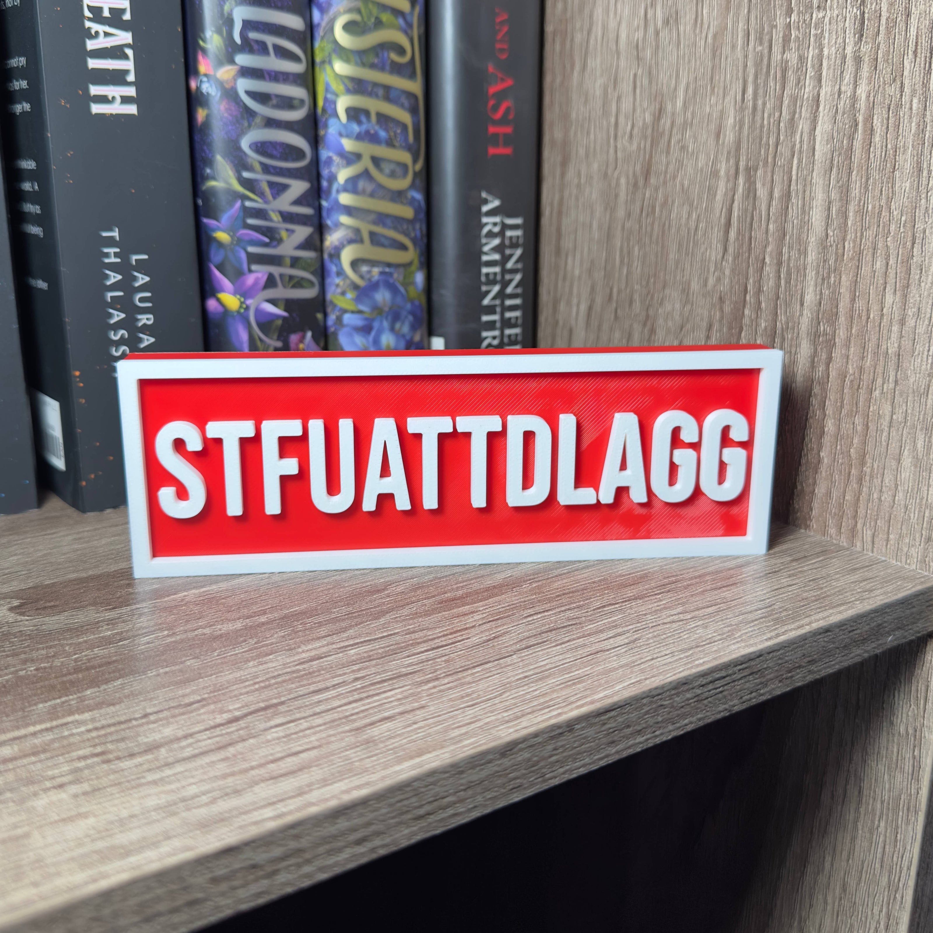 STFUATTDLAGG Sign | Bookshelf Decor: Black