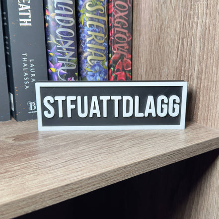 STFUATTDLAGG Sign | Bookshelf Decor: Black